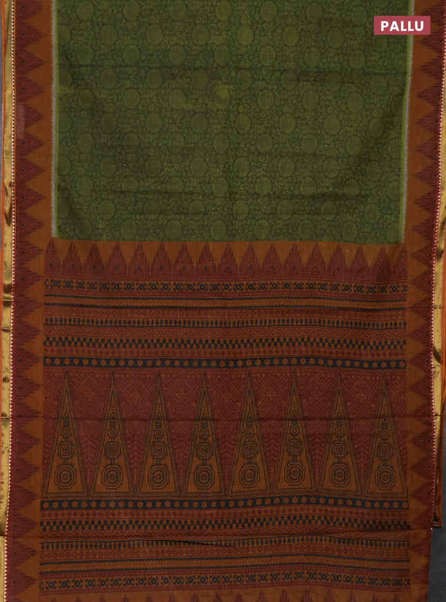 Muslin cotton saree sap green and dark mustard with allover prints and zari woven border