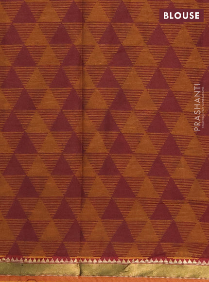 Muslin cotton saree sap green and dark mustard with allover prints and zari woven border