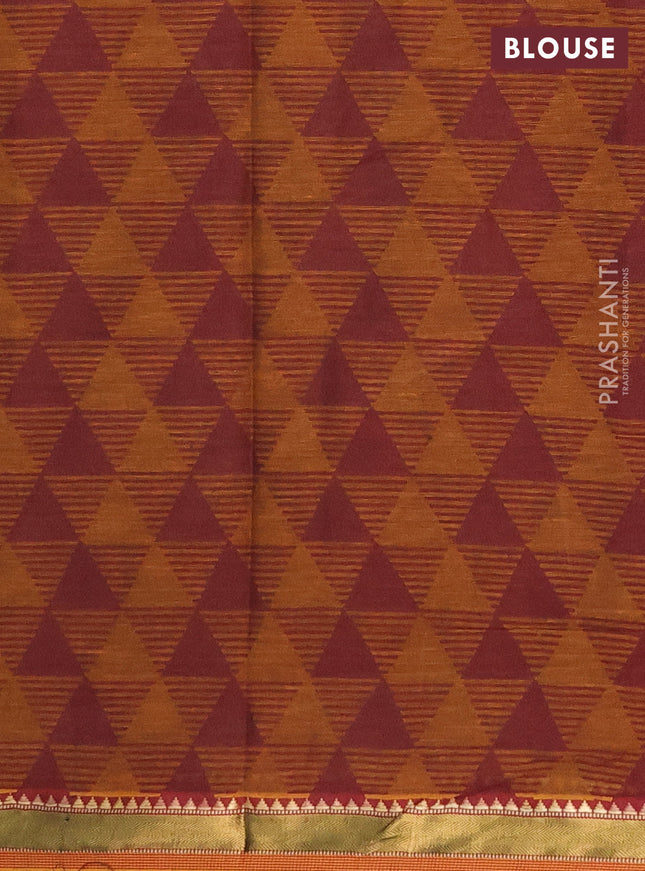 Muslin cotton saree sap green and dark mustard with allover prints and zari woven border