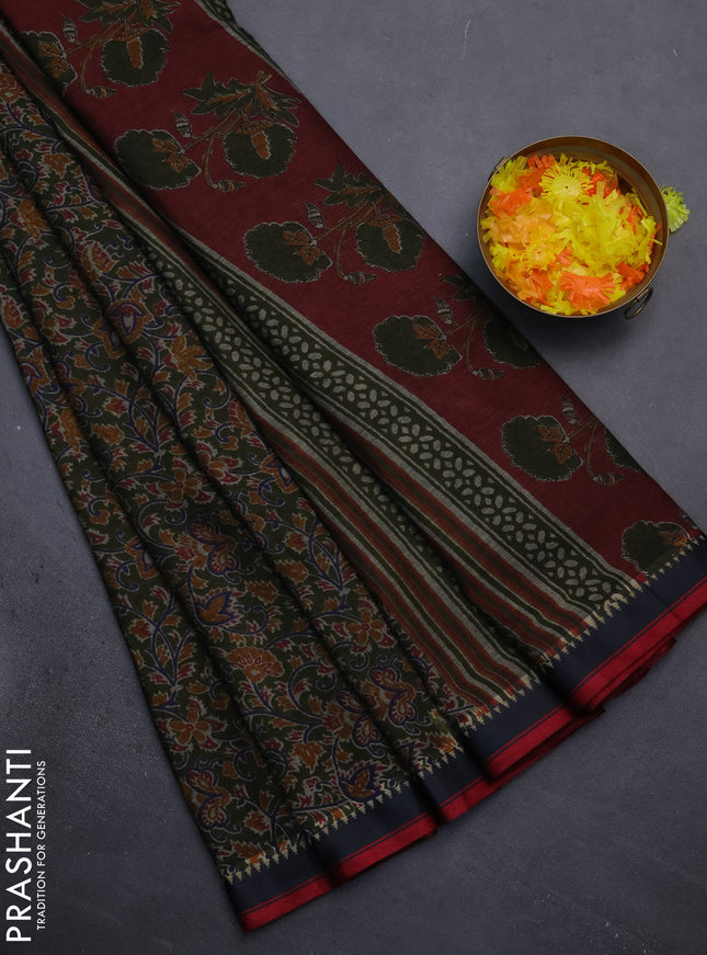 Muslin cotton saree sap green and navy blue with allover prints and woven border