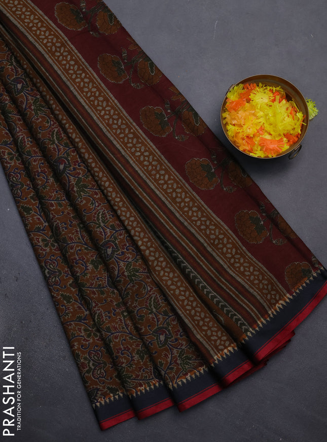 Muslin cotton saree mustard shade and black with allover prints and woven border