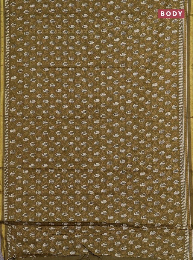 Muslin cotton saree mehendi green with allover dabu prints and zari woven border