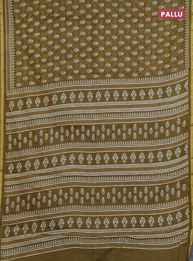 Muslin cotton saree mehendi green with allover dabu prints and zari woven border