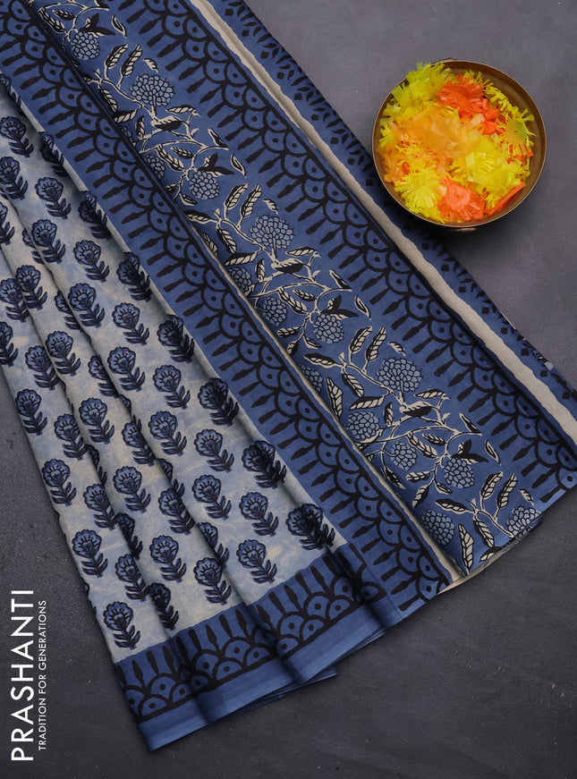 Muslin cotton saree blue shade with floral butta prints and printed border