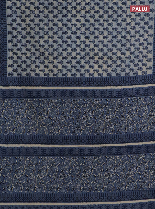 Muslin cotton saree blue shade with floral butta prints and printed border