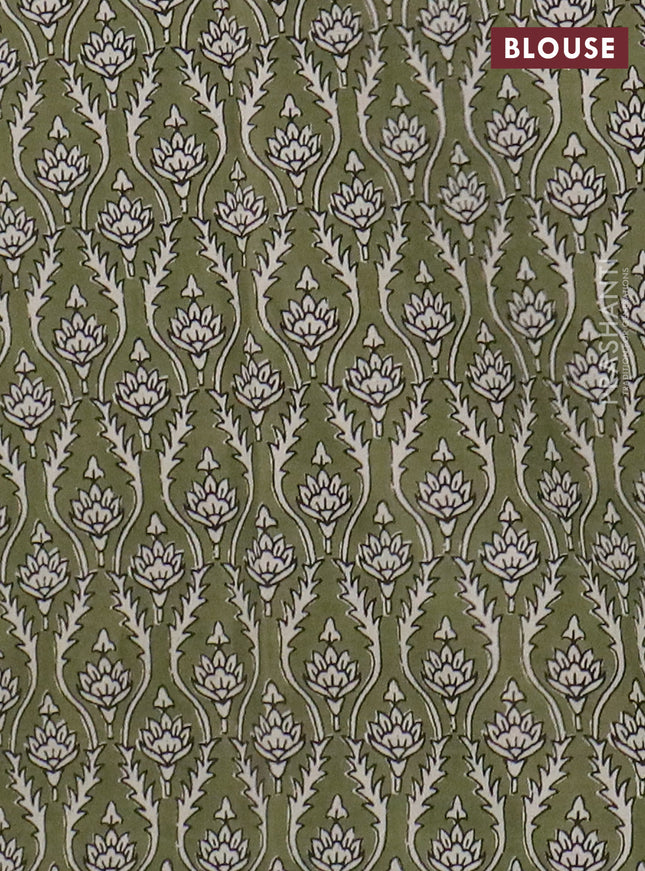 Muslin cotton saree beige and pastel green with floral butta prints and printed border