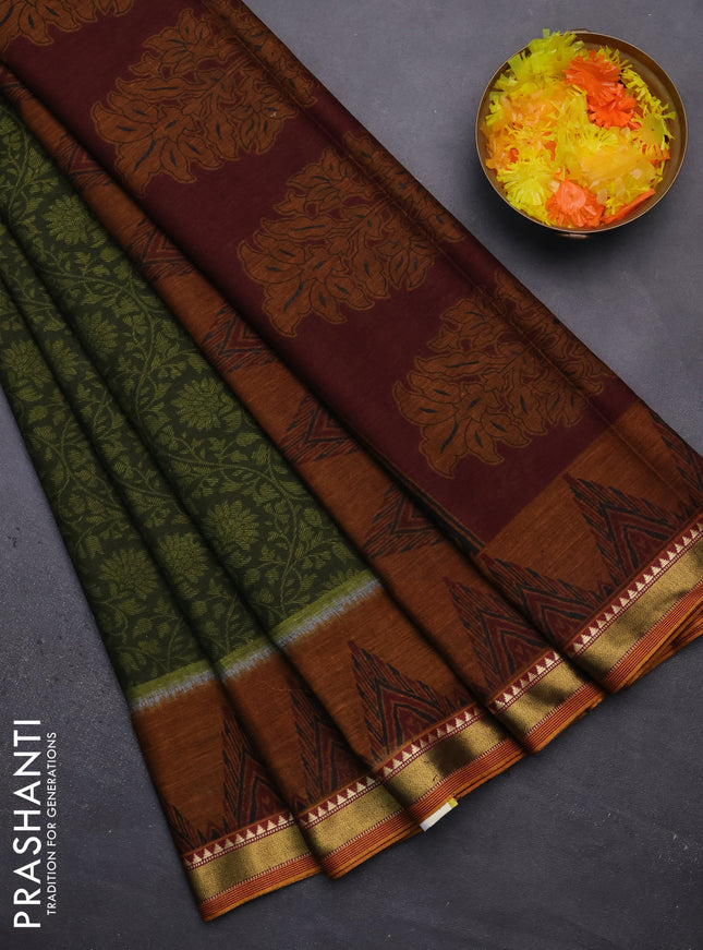 Muslin cotton saree sap green and dark mustard with allover prints and zari woven border