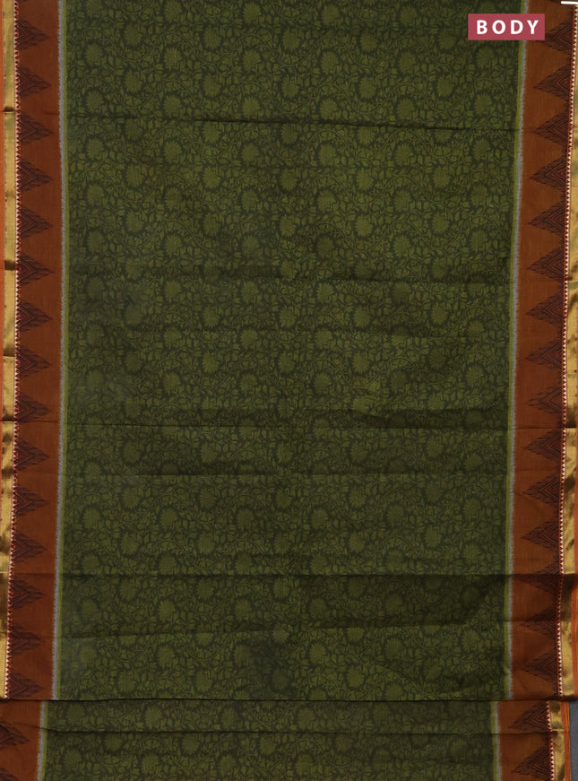 Muslin cotton saree sap green and dark mustard with allover prints and zari woven border