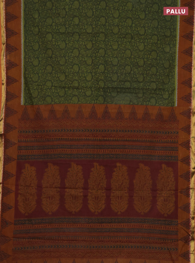 Muslin cotton saree sap green and dark mustard with allover prints and zari woven border