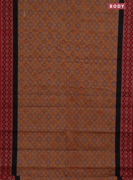 Muslin cotton saree dark mustard and maroon with ajrakh prints and printed border