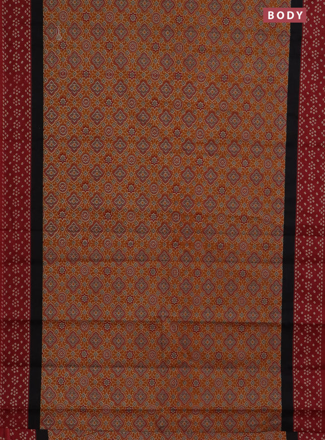 Muslin cotton saree dark mustard and maroon with ajrakh prints and printed border
