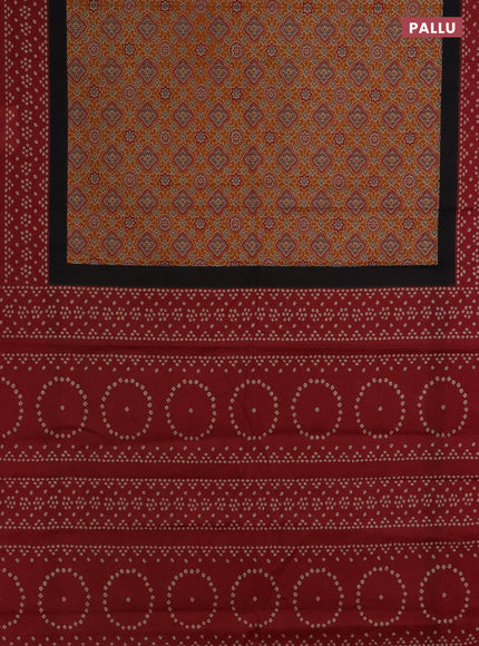 Muslin cotton saree dark mustard and maroon with ajrakh prints and printed border