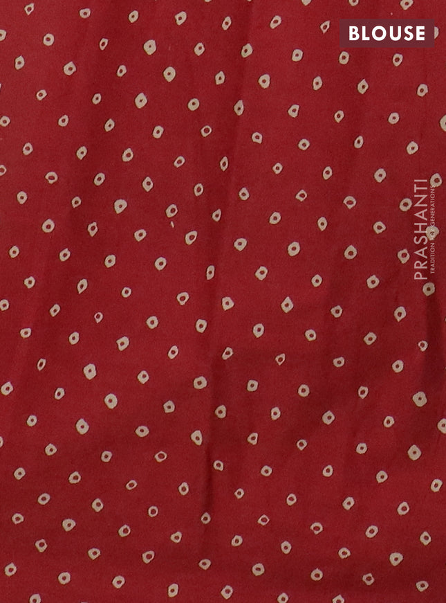 Muslin cotton saree dark mustard and maroon with ajrakh prints and printed border