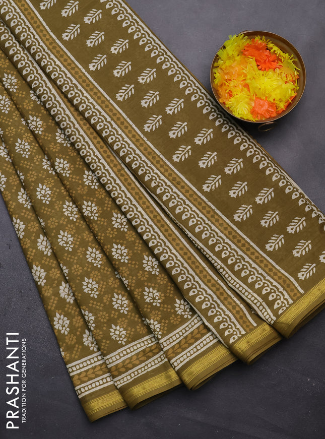 Muslin cotton saree mehendi green with allover prints and zari woven border