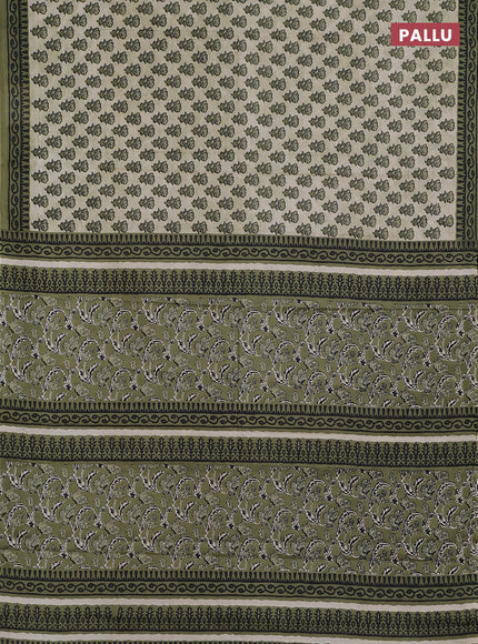 Muslin cotton saree elaichi green and pastel green with floral butta prints and printed border
