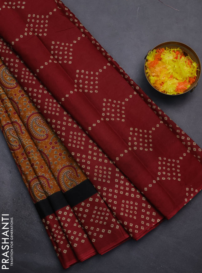 Muslin cotton saree mustard yellow and maroon with paisley prints and printed border