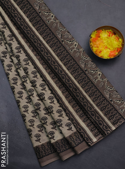 Muslin cotton saree beige and brown with floral butta prints and printed border