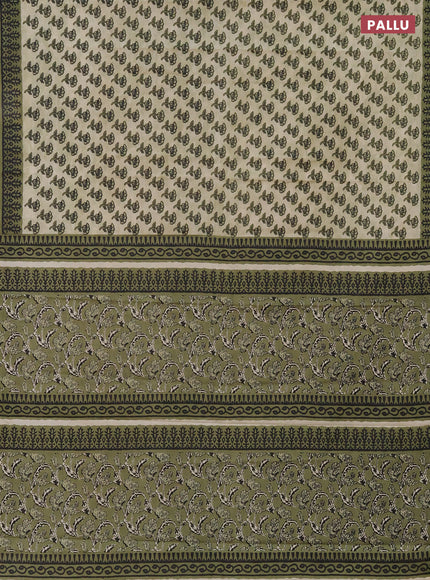 Muslin cotton saree elaichi green and sap green with floral butta prints and printed border