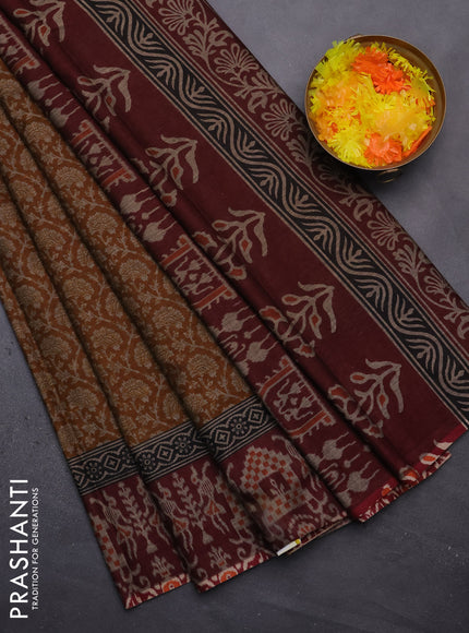 Muslin cotton saree dark mustard and maroon with allover prints and printed border