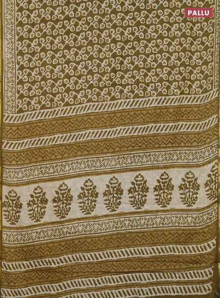 Muslin cotton saree mehendi green with allover prints and zari woven border