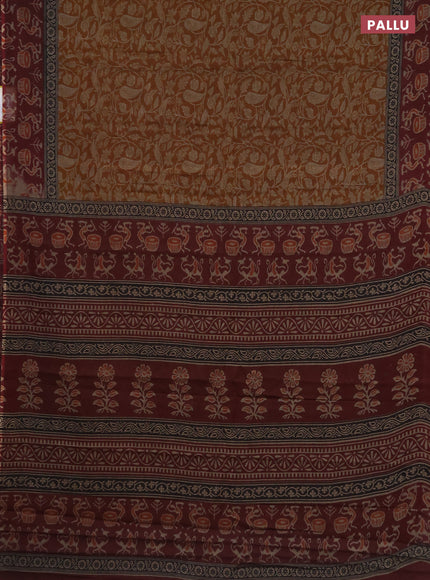 Muslin cotton saree dark mustard and maroon with allover prints and printed border