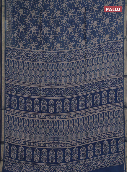 Muslin cotton saree peacock blue with allover prints and zari woven border