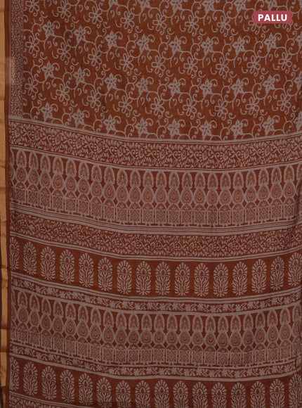 Muslin cotton saree dark mustard with allover prints and zari woven border