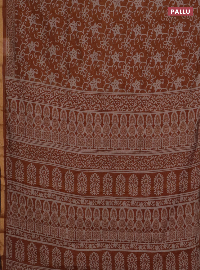 Muslin cotton saree dark mustard with allover prints and zari woven border