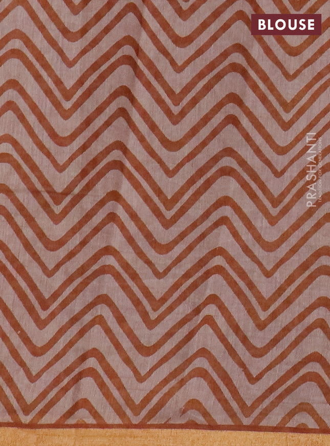 Muslin cotton saree dark mustard with allover prints and zari woven border