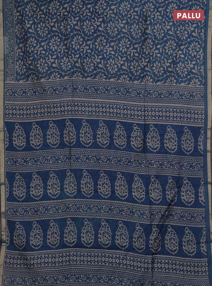 Muslin cotton saree peacock blue with allover prints and zari woven border