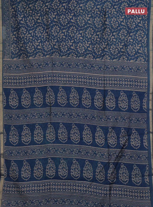 Muslin cotton saree peacock blue with allover prints and zari woven border