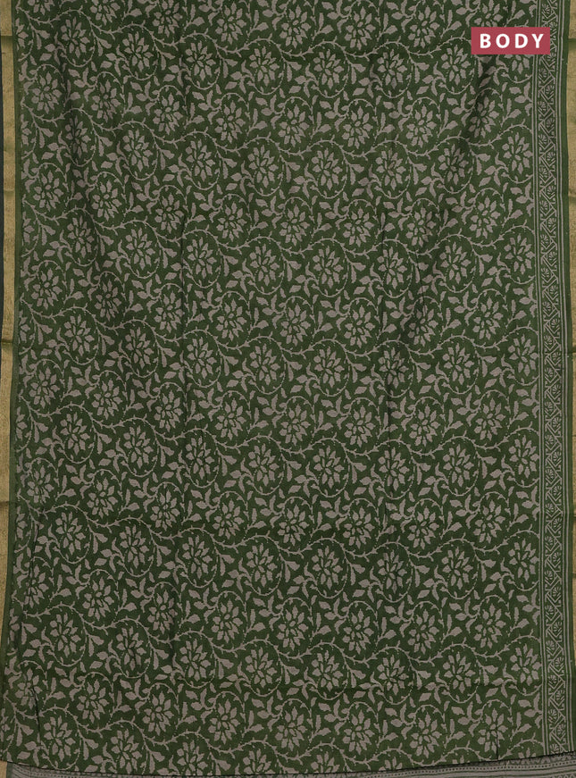 Muslin cotton saree green with allover prints and zari woven border