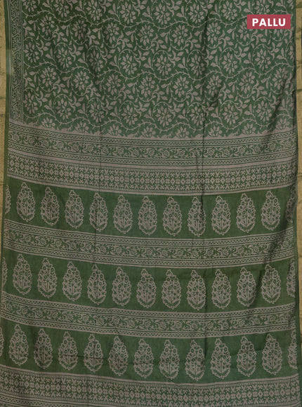 Muslin cotton saree green with allover prints and zari woven border