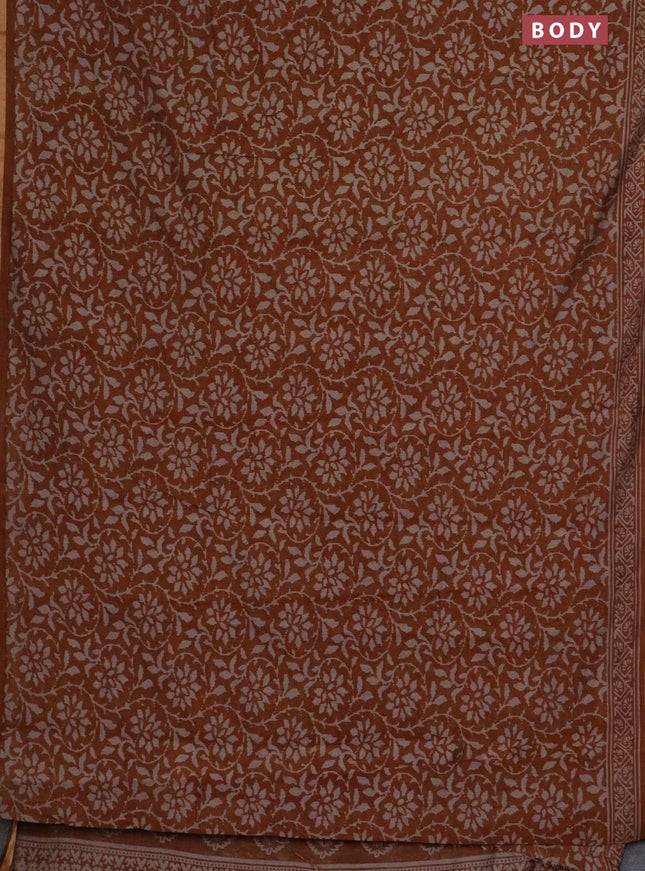 Muslin cotton saree dark mustard with allover prints and zari woven border