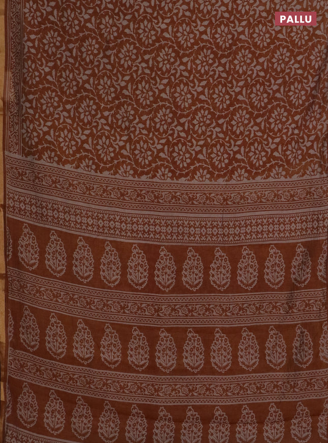Muslin cotton saree dark mustard with allover prints and zari woven border