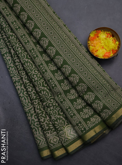 Muslin cotton saree green with allover kalamkari prints and zari woven border