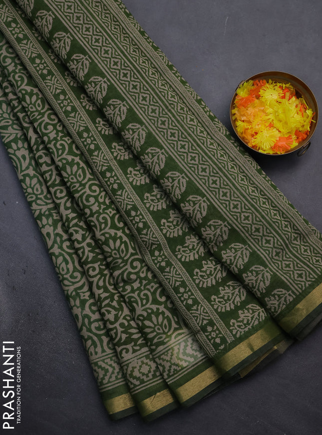 Muslin cotton saree green with allover kalamkari prints and zari woven border