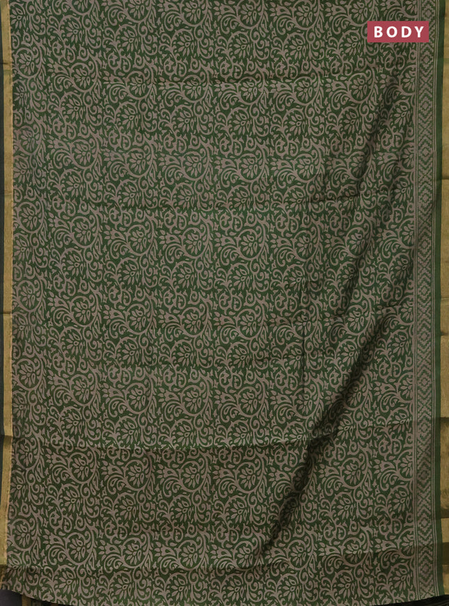 Muslin cotton saree green with allover kalamkari prints and zari woven border
