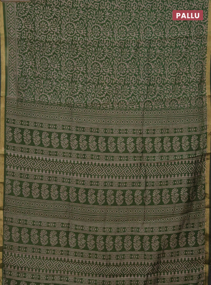 Muslin cotton saree green with allover kalamkari prints and zari woven border