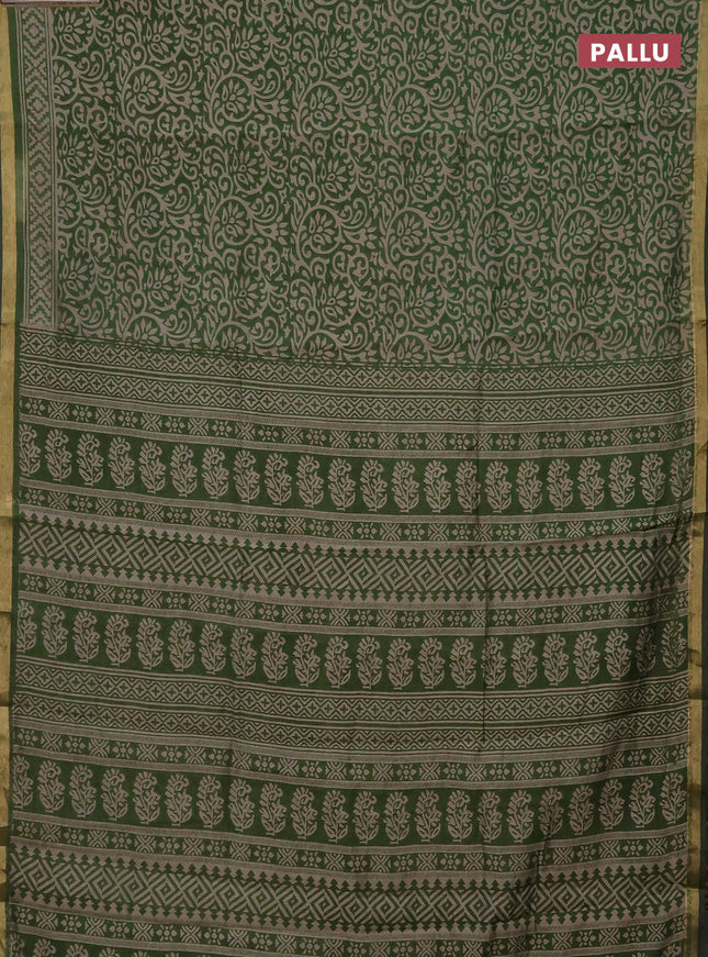 Muslin cotton saree green with allover kalamkari prints and zari woven border