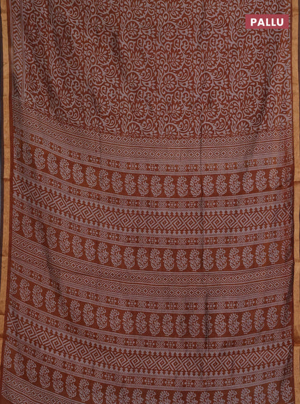 Muslin cotton saree dark mustard with allover kalamkari prints and zari woven border