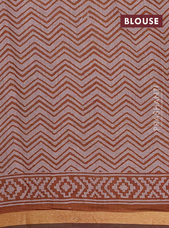 Muslin cotton saree dark mustard with allover kalamkari prints and zari woven border