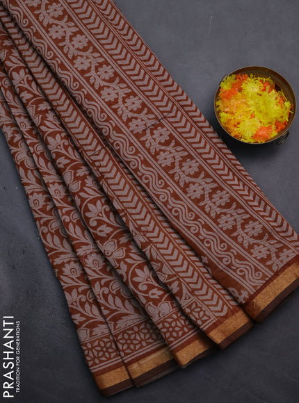 Muslin cotton saree dark mustard with allover kalamkari prints and zari woven border