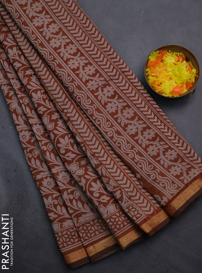 Muslin cotton saree dark mustard with allover kalamkari prints and zari woven border