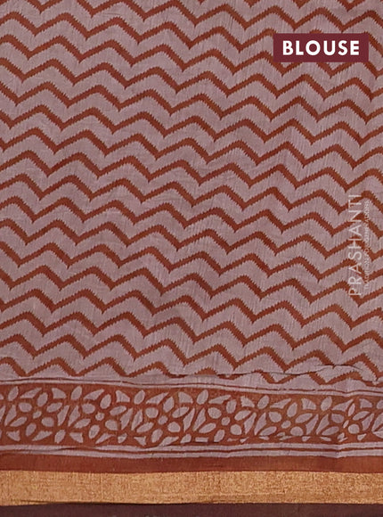 Muslin cotton saree dark mustard with allover kalamkari prints and zari woven border