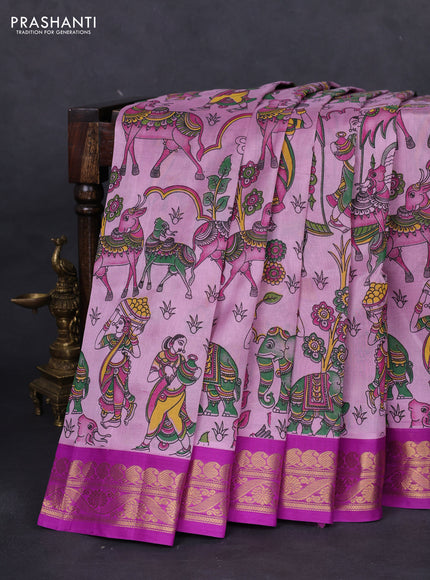 Silk cotton saree mild lavender and purple with allover kalamkari prints and zari woven korvai border