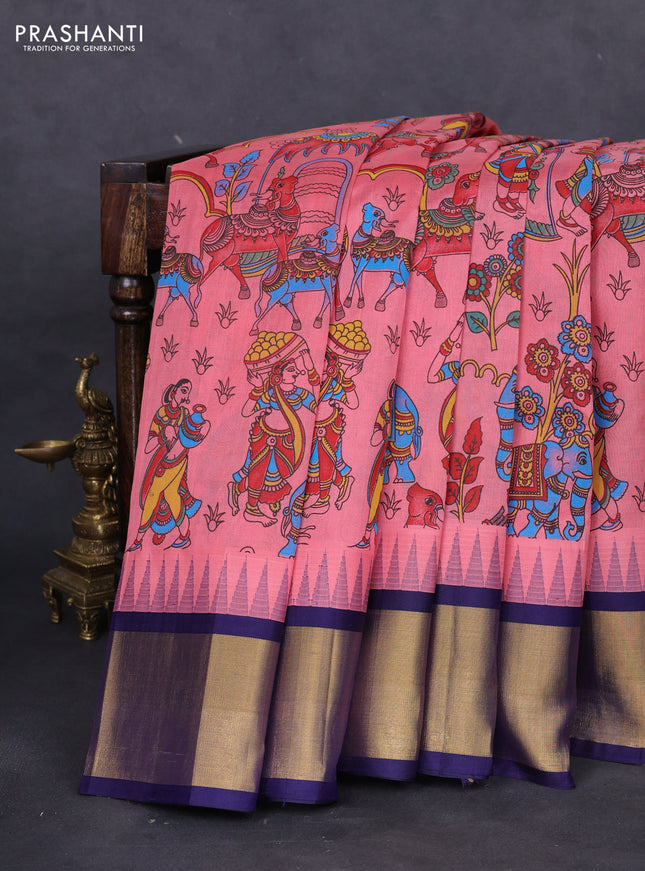 Silk cotton saree peach pink and dark blue with allover kalamkari prints and temple design zari woven border