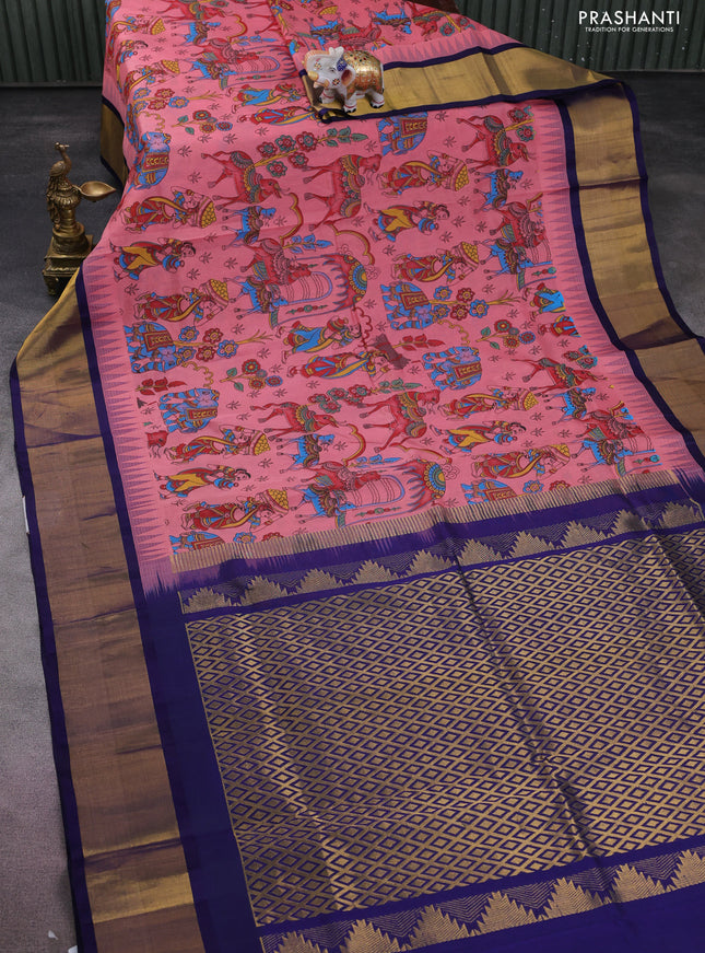Silk cotton saree peach pink and dark blue with allover kalamkari prints and temple design zari woven border
