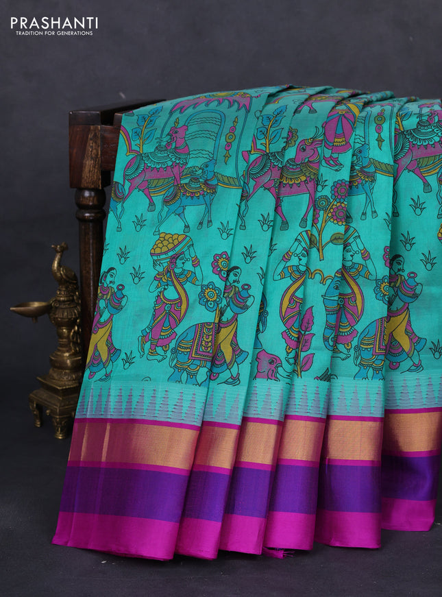 Silk cotton saree teal blue and purple with allover kalamkari prints and temple design zari woven simple border