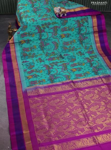Silk cotton saree teal blue and purple with allover kalamkari prints and temple design zari woven simple border